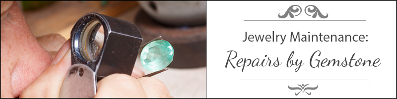 jewelry repair of aquamarine gem by jeweler looking through magnifier